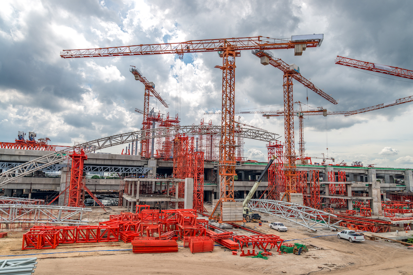 industrial sites and cranes at construction site