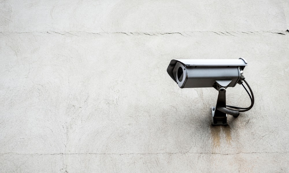 equipment yard security camera mounted on a concrete wall